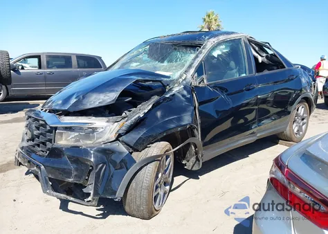 2023 Honda Passport Awd Ex-L z USA, uszkodzony, nr VIN 5FNYF8H5XPB009512